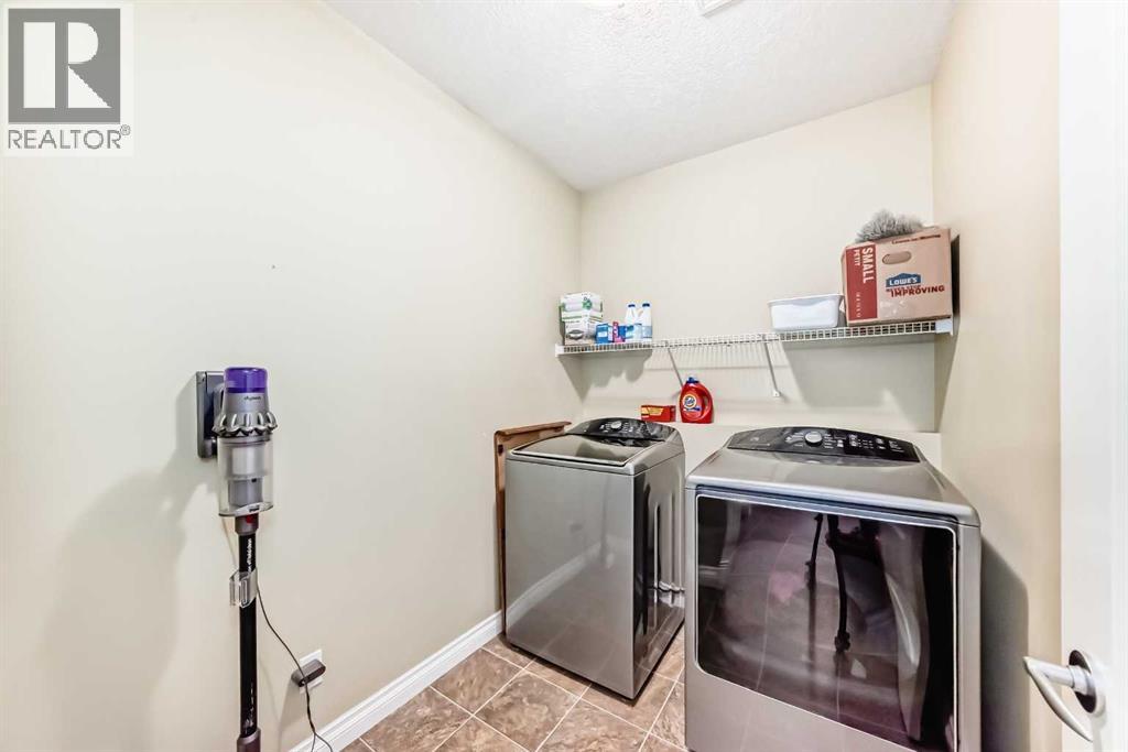 187 Hawkmere View, Chestermere, Alberta  T1X 1T8 - Photo 18 - A2285861