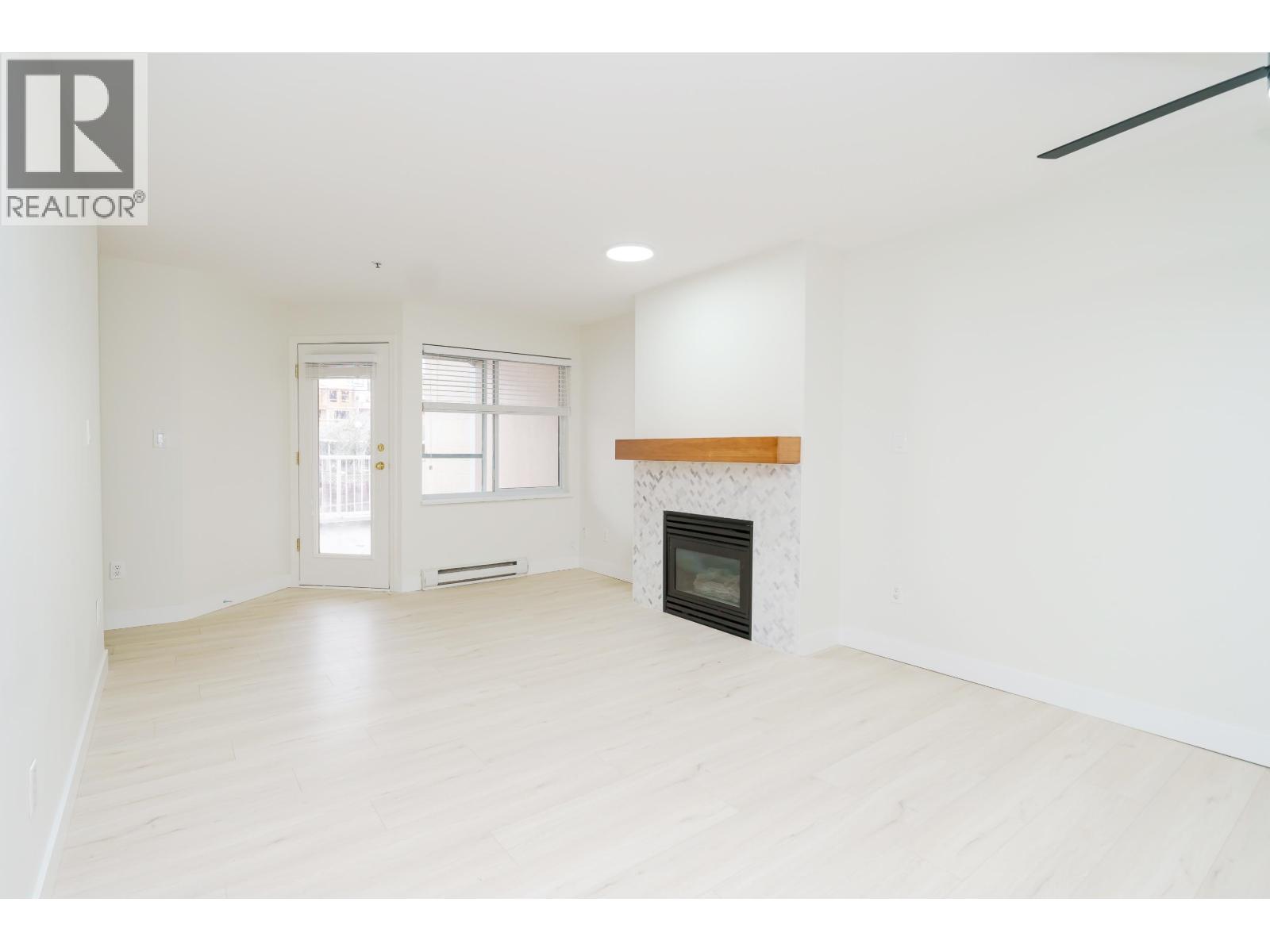 201 22351 St Anne Avenue, Maple Ridge, British Columbia  V2X 2E7 - Photo 2 - R3089529