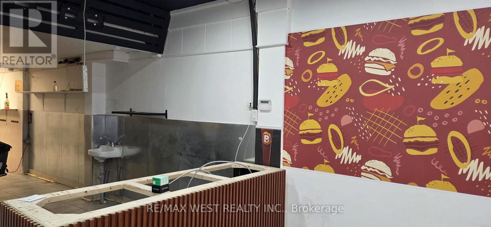 Store Front Plus Basement - 1210 King Street W, Toronto, Ontario  M6K 1G4 - Photo 2 - W12785392