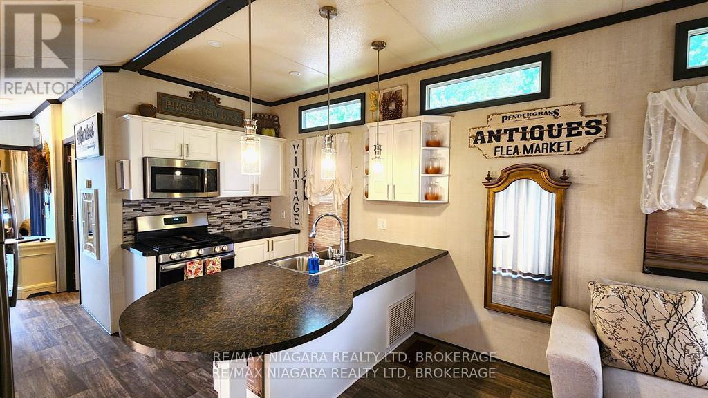 246 - 8845 Lundy's Lane, Niagara Falls, Ontario L2H 1H5 - Photo 5 - X12785418