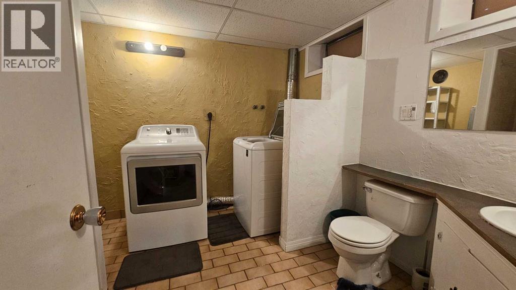 4 Clarendon Road Nw, Calgary, Alberta  T2L 0P1 - Photo 11 - A2285041