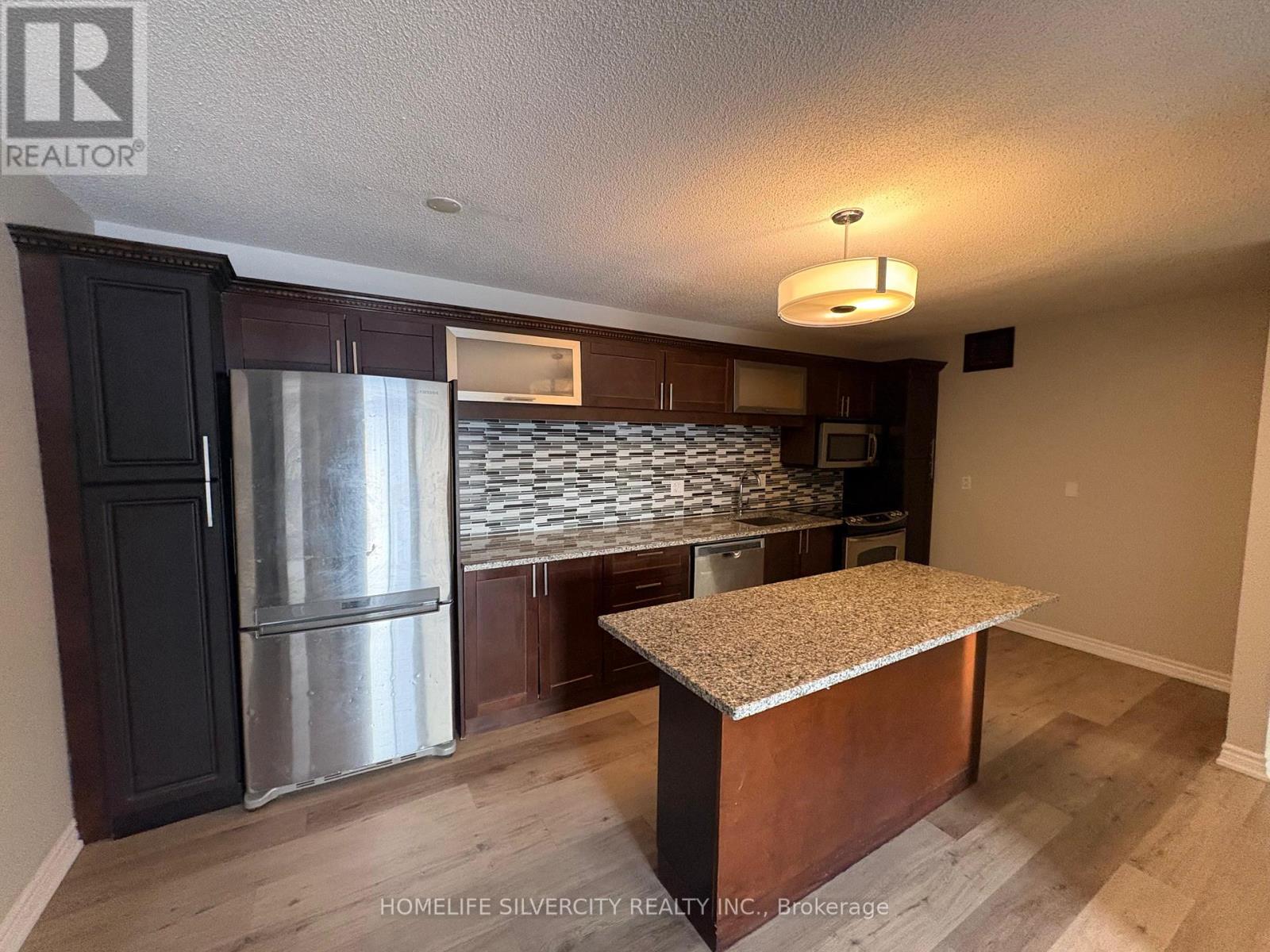 1112 - 1450 Glen Abbey Gate, Oakville, Ontario  L6M 2V7 - Photo 6 - W12764492