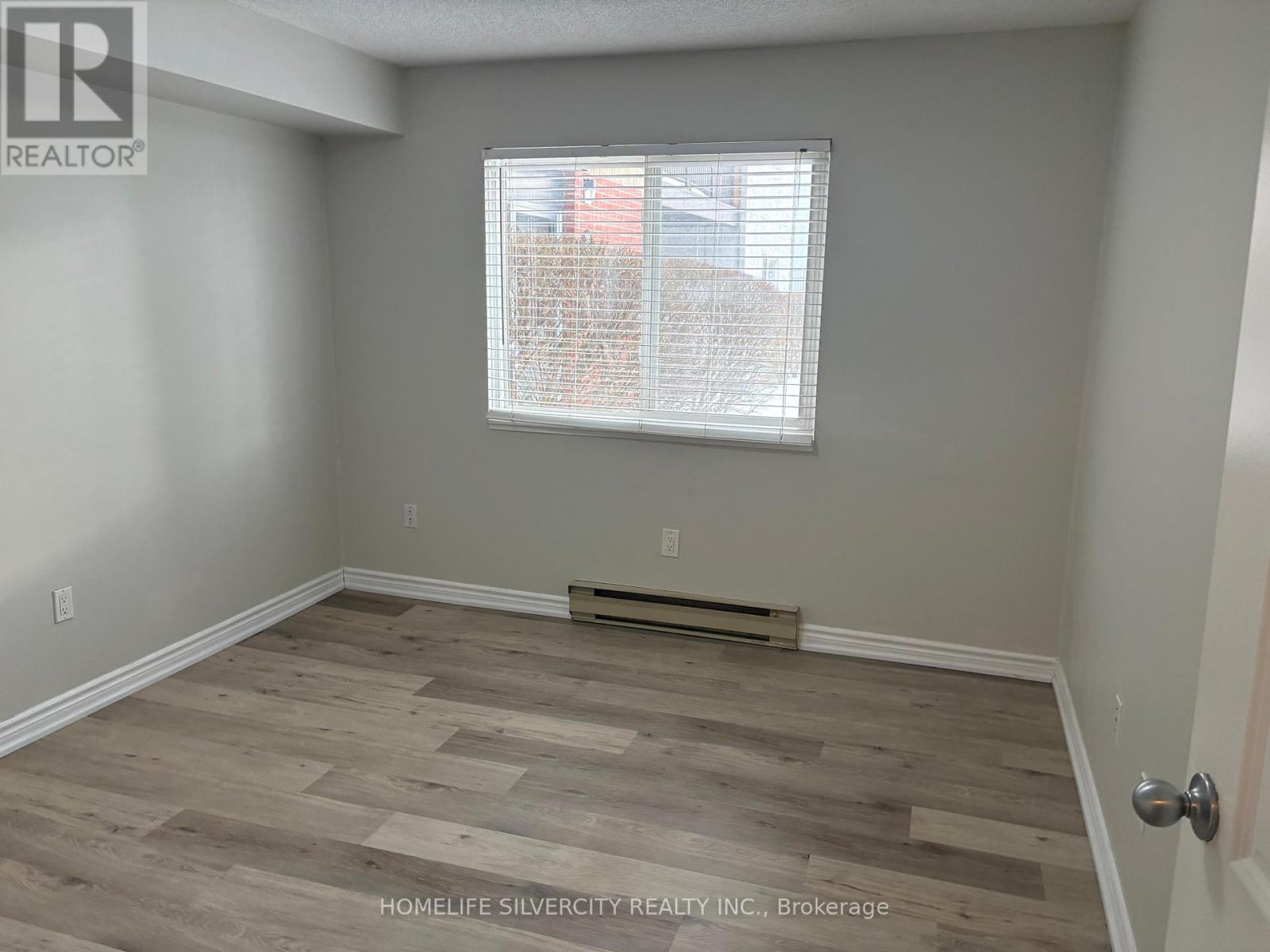 1112 - 1450 Glen Abbey Gate, Oakville, Ontario  L6M 2V7 - Photo 4 - W12764492