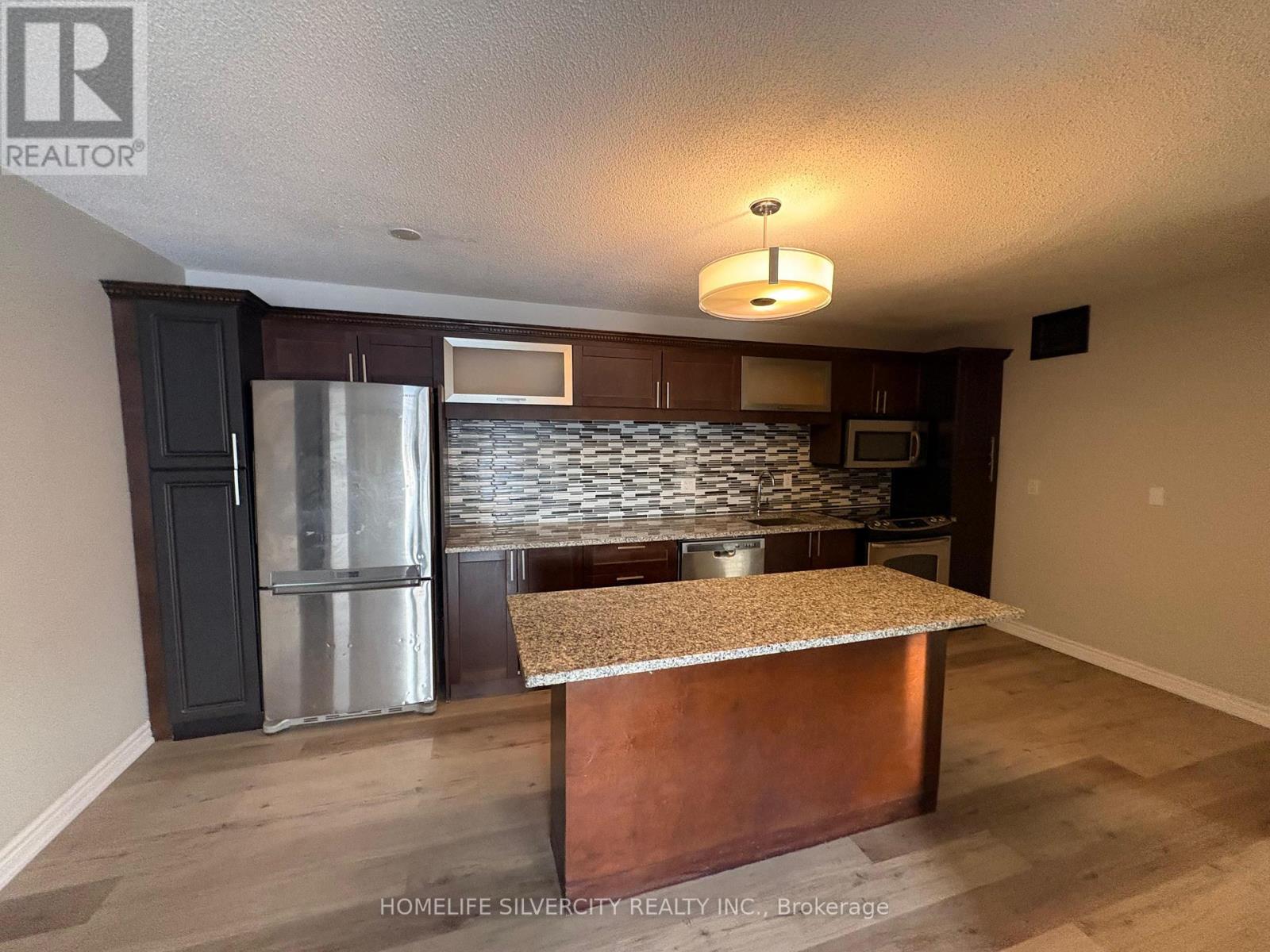 1112 - 1450 Glen Abbey Gate, Oakville, Ontario  L6M 2V7 - Photo 7 - W12764492