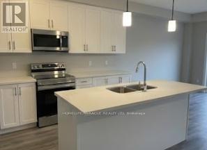 163 Otterbein Road, Kitchener, Ontario  N2B 0A8 - Photo 4 - X12785620