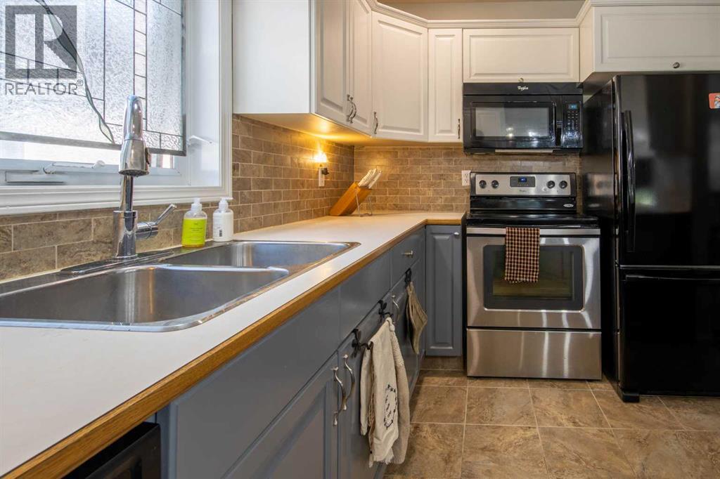 B, 303 Centre Street N, Sundre, Alberta  T0M 1X0 - Photo 9 - A2284925