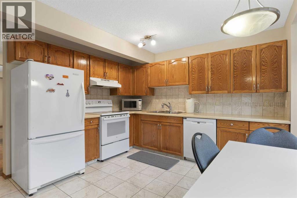 66 Patina Point Sw, Calgary, Alberta  T3H 3J7 - Photo 4 - A2283812