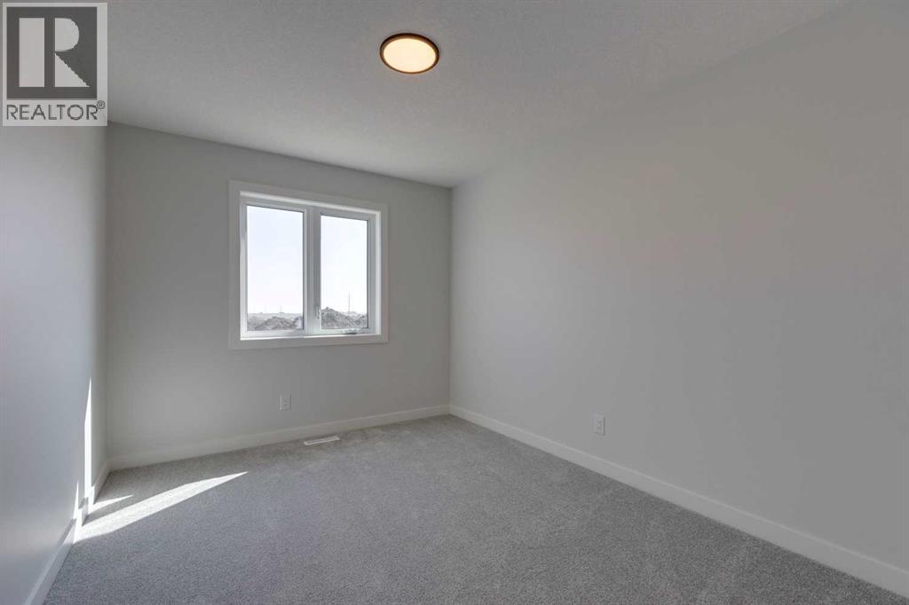 65 Southborough Lane, Cochrane, Alberta  T4C 3J5 - Photo 8 - A2285758