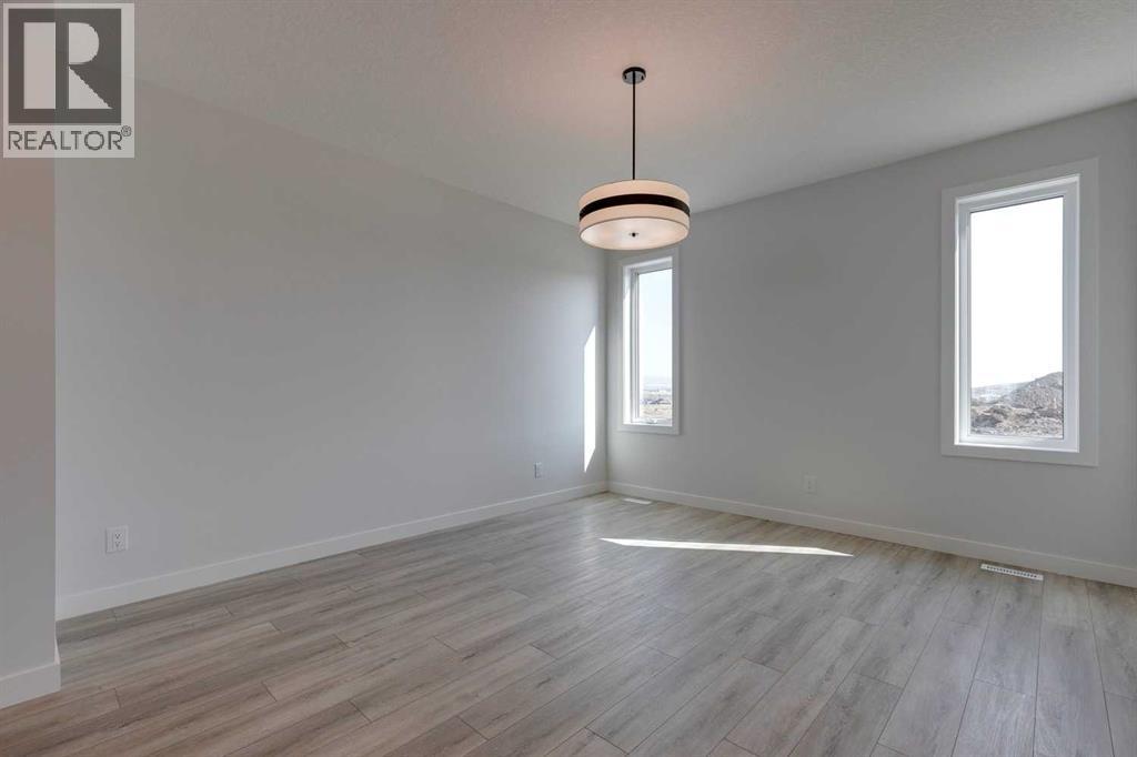 65 Southborough Lane, Cochrane, Alberta  T4C 3J5 - Photo 7 - A2285758