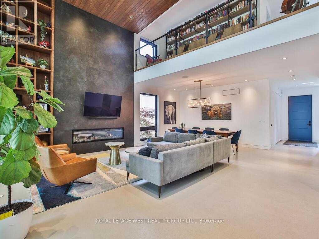 Contemporary meets Mid-Century Modern in this unique, custom-built Bone Structure home, featuring every designer detail. Radiant heated floors throughout. Sleek Scavolini kitchen and cabinetry. Entertain effortlessly in the gourmet kitchen equipped with a professional range featuring a steam oven and warming drawer, touch-open panels concealing the fridge and freezer, and custom solid-slab Laminam porcelain countertops and backsplash.This home offers four generously sized bedrooms. The large primary suite features tranquil views of the pool and garden, along with a luxurious ensuite complete with a deluxe soaker tub and a glass-enclosed shower with multiple shower heads.The expansive living and dining areas are ideal for both family gatherings and elegant entertaining. Just outside you enter a private garden oasis with a salt-water pool complete with automation and swim jets, or unwind in the large six-person Beachcomber hot tub. Lighting, whole-home audio, security, and window coverings are all controlled via touchscreen panels or remotely through a smartphone app. A full-home backup generator powers the entire house, including heating, air conditioning, pool, and hot tub.This property has a 79 Walk Score.  The main floor office and the 2nd floor gym can be re-configured into additional bedrooms (id:48254)