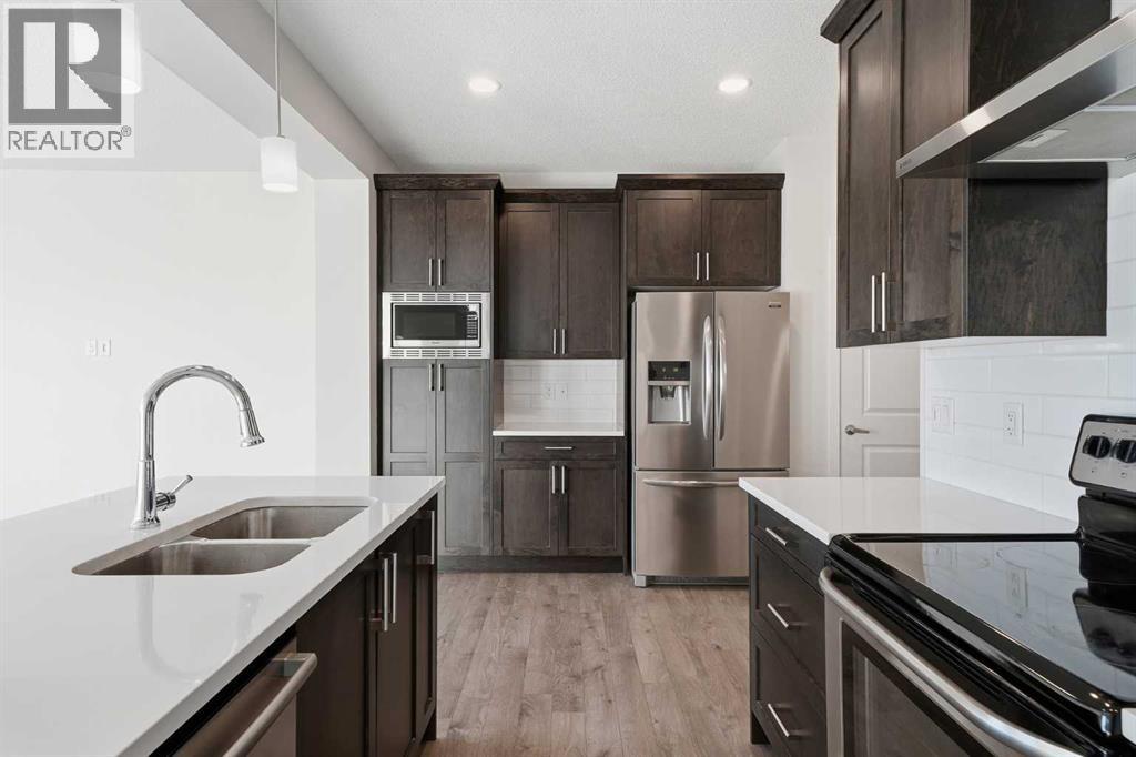 305 Hillcrest Road Sw, Airdrie, Alberta  T4B 4K1 - Photo 8 - A2285814