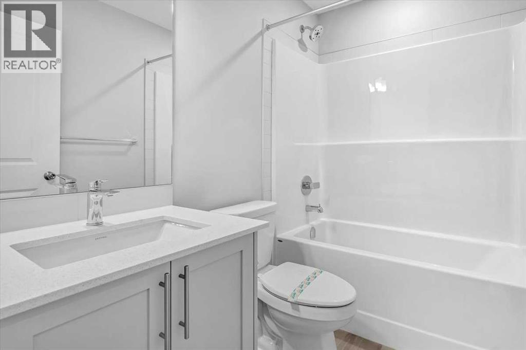 74 Wedderburn Drive, Okotoks, Alberta  T1S 5X2 - Photo 18 - A2277430