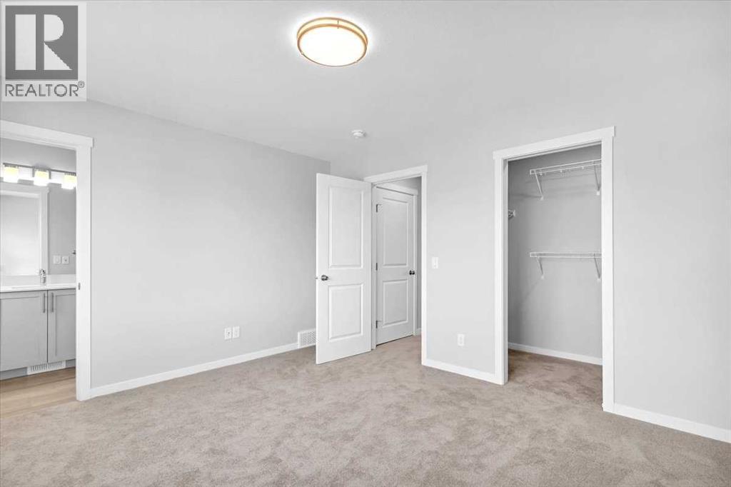 74 Wedderburn Drive, Okotoks, Alberta  T1S 5X2 - Photo 23 - A2277430