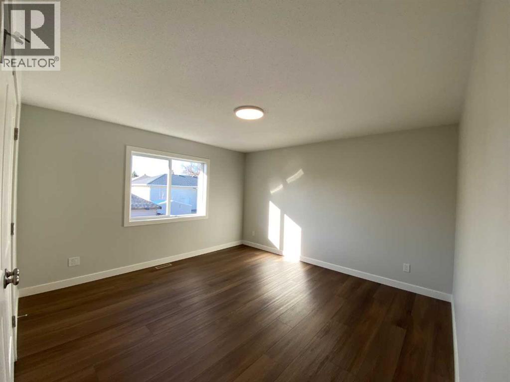 4210 57 Street, Taber, Alberta  T1G 0G8 - Photo 11 - A2286267