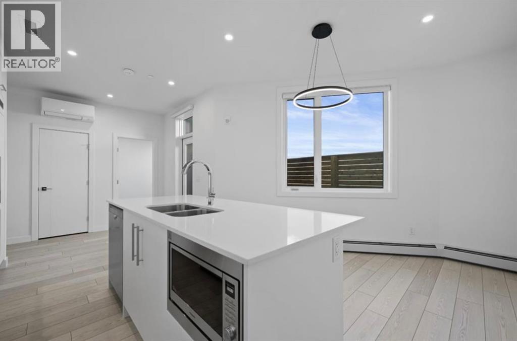 102, 8370 Broadcast Avenue Sw, Calgary, Alberta  T3H 6L3 - Photo 5 - A2281558