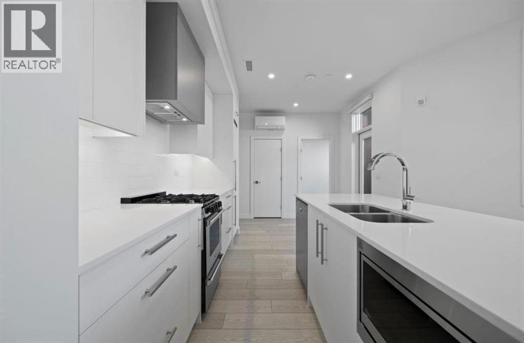 102, 8370 Broadcast Avenue Sw, Calgary, Alberta  T3H 6L3 - Photo 4 - A2281558