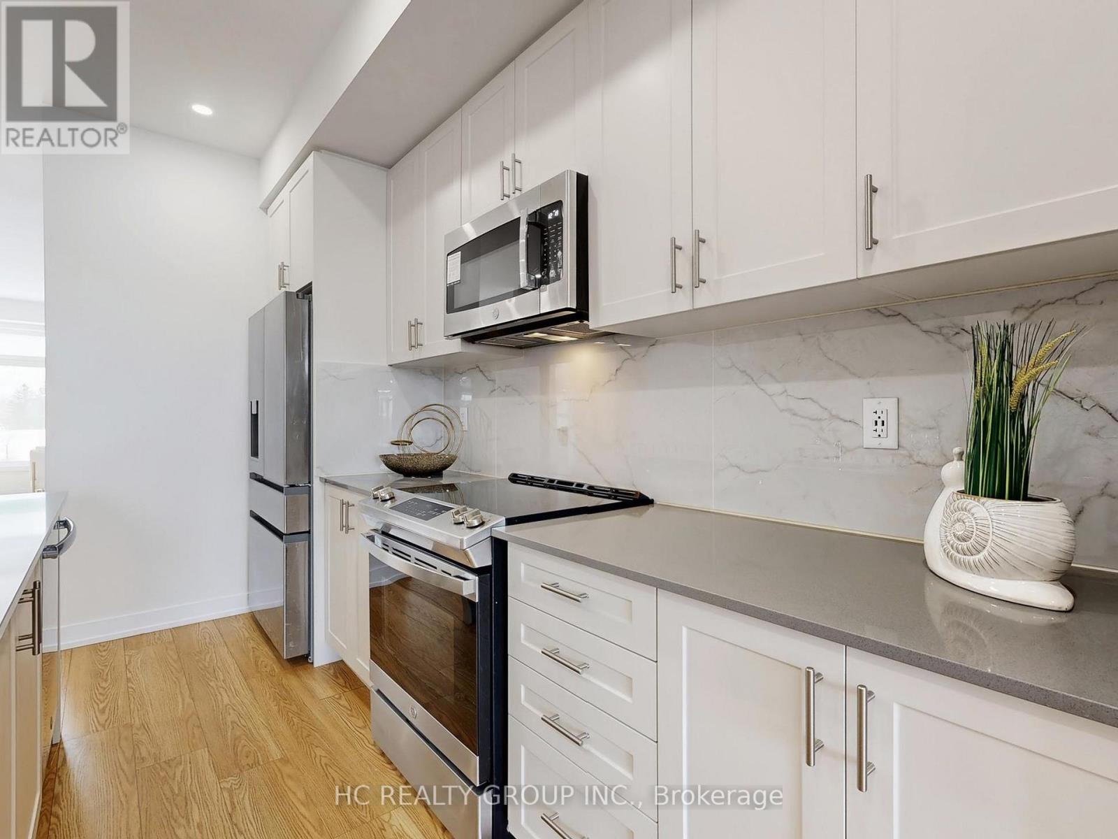 1810 Donald Cousens Parkway, Markham (Cornell), Ontario  L6B 0V5 - Photo 8 - N12787014