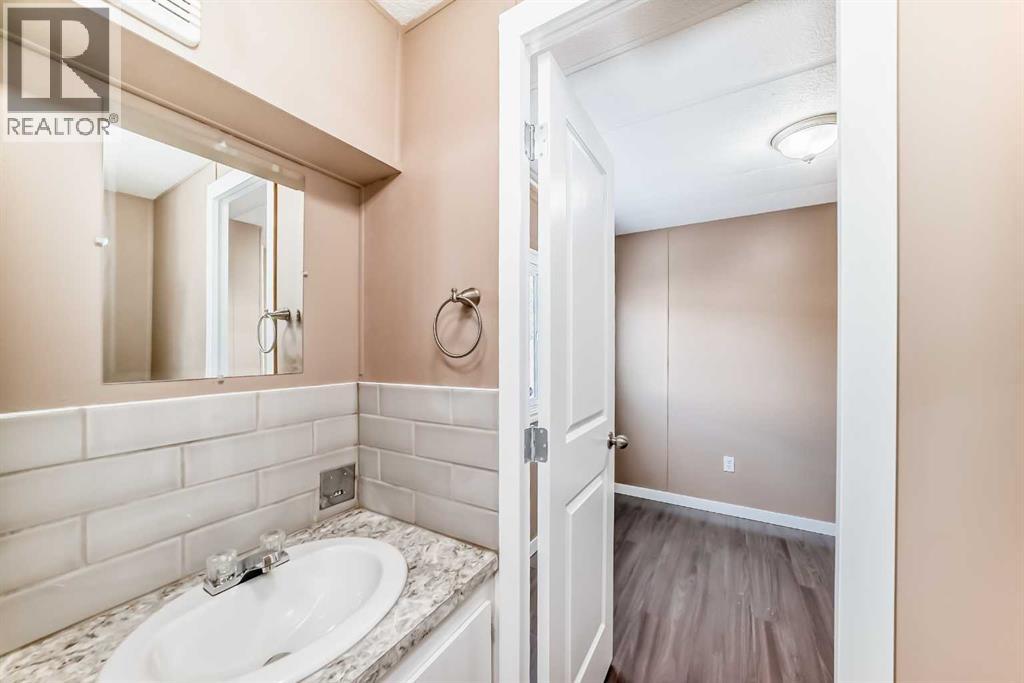 24 Spring Dale Circle Se, Airdrie, Alberta  T4A 1P2 - Photo 21 - A2286307