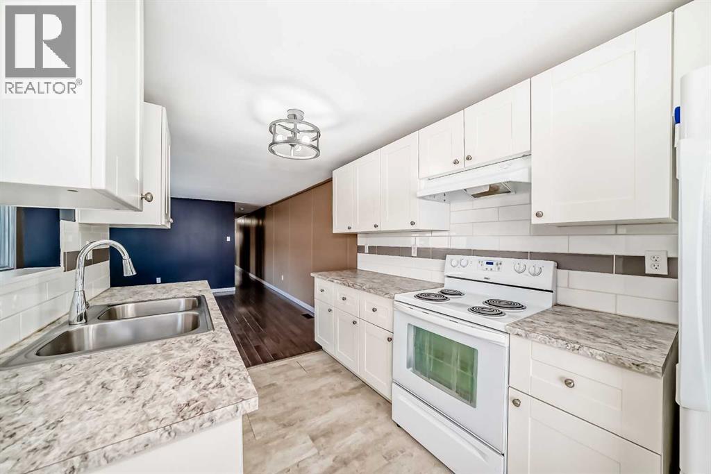 24 Spring Dale Circle Se, Airdrie, Alberta  T4A 1P2 - Photo 7 - A2286307