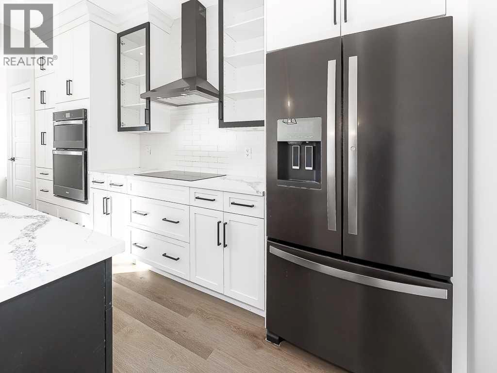 31 Belmont Gardens Sw, Calgary, Alberta  T2C 4H8 - Photo 5 - A2285475