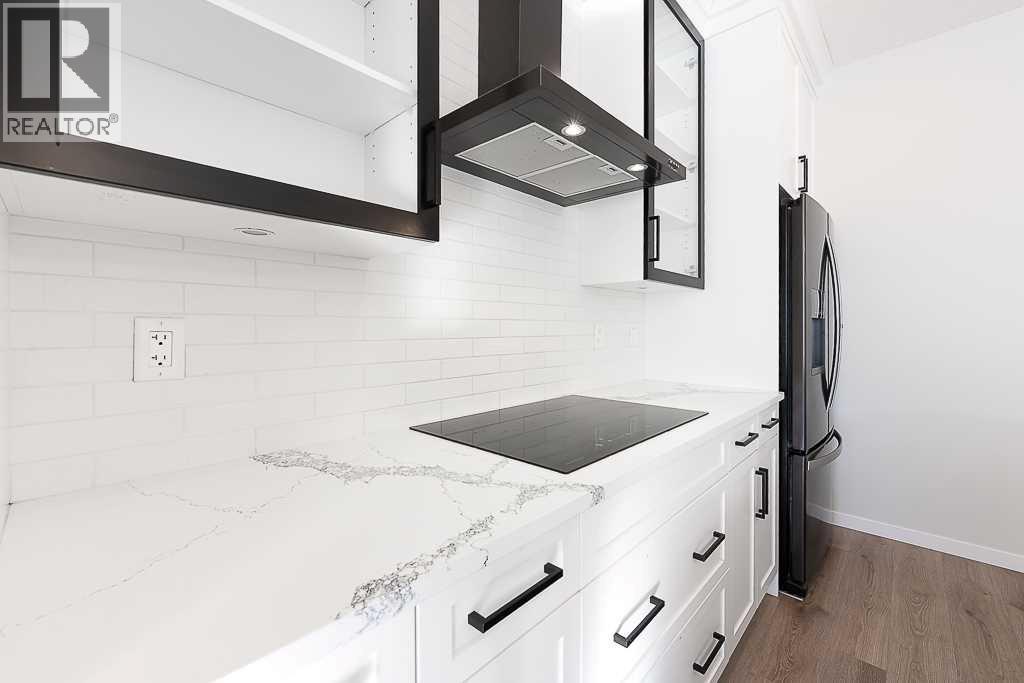 31 Belmont Gardens Sw, Calgary, Alberta  T2C 4H8 - Photo 6 - A2285475