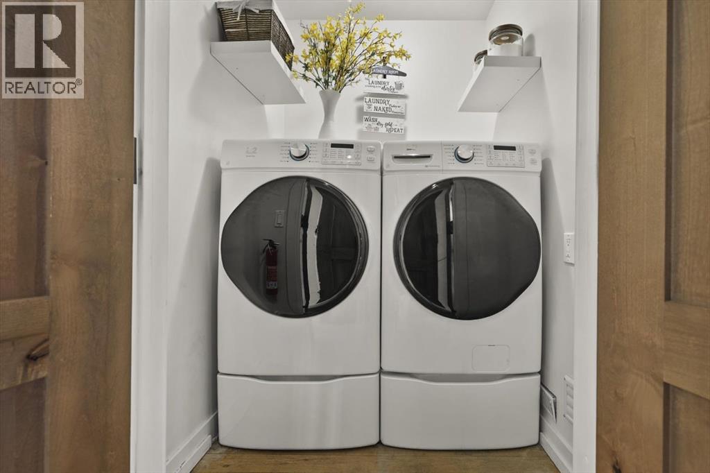 19 Bearspaw Summit Rise, Rural Rocky View County, Alberta  T3R 1H2 - Photo 31 - A2282919