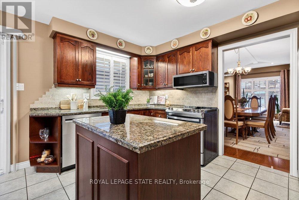 128 Nugent Drive, Hamilton, Ontario  L8H 2M8 - Photo 2 - X12787716