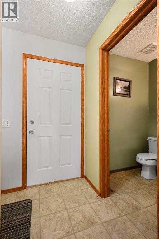 132 Bow Ridge Drive, Cochrane, Alberta  T4C 1V8 - Photo 15 - A2282061