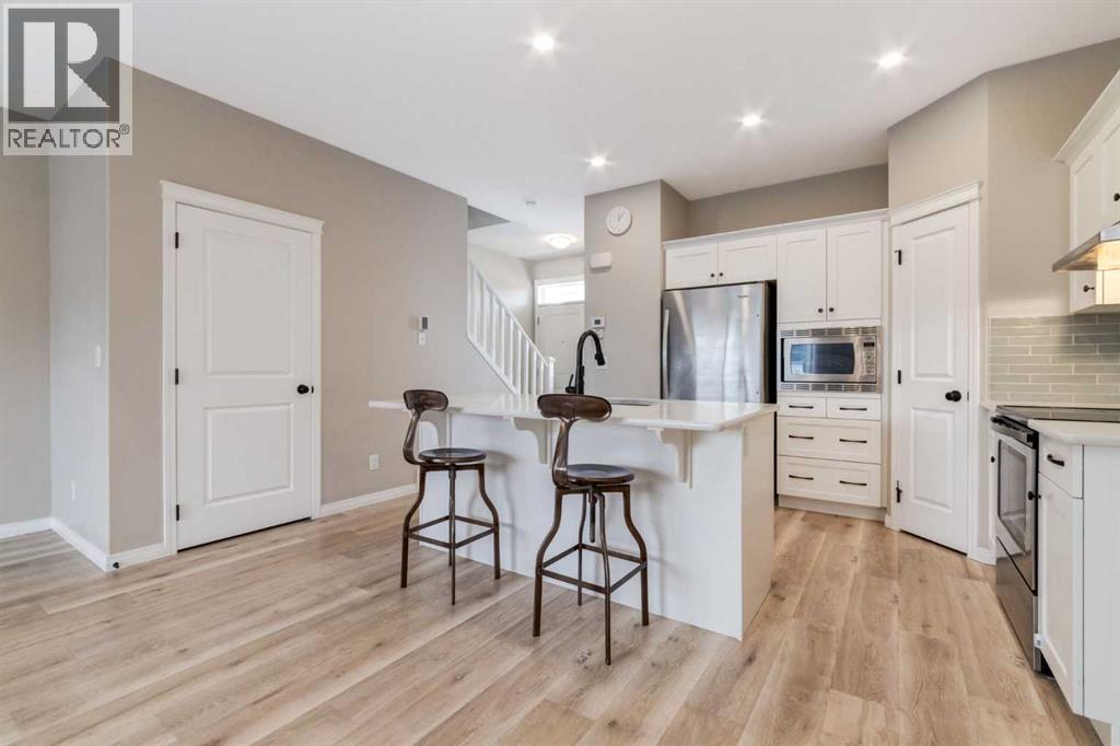 730 Belmont Drive Sw, Calgary, Alberta  T2X 4H3 - Photo 7 - A2286204