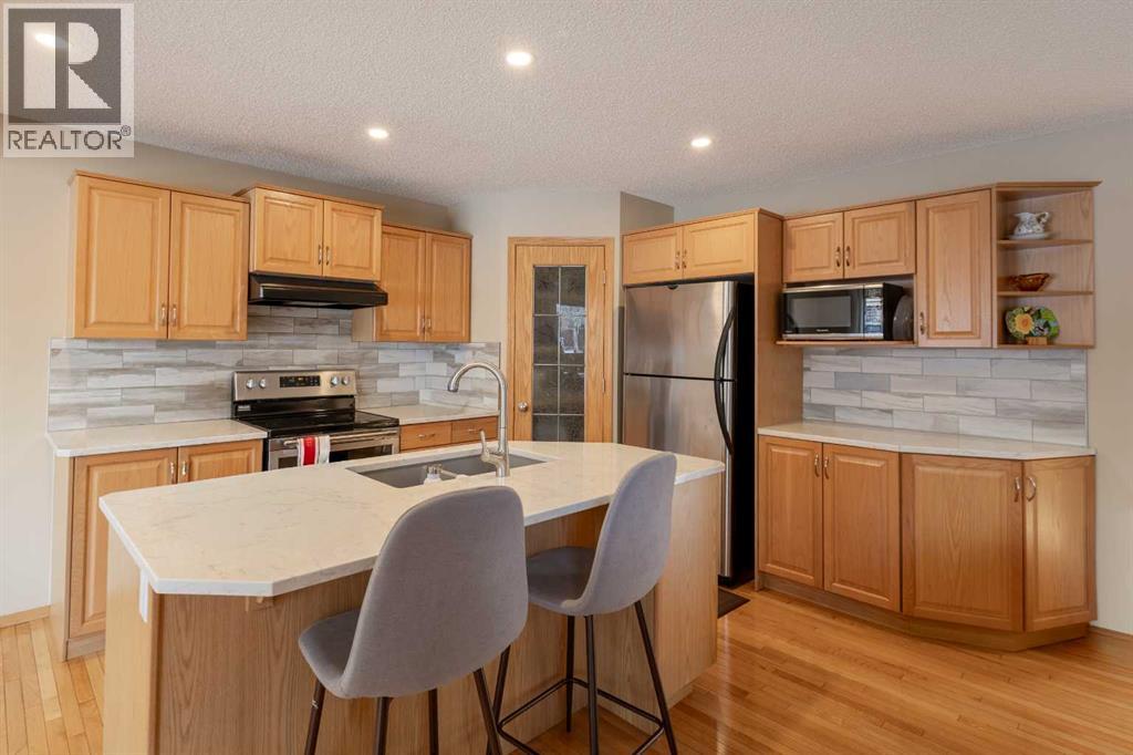 20 Tuscany Ridge Crescent Nw, Calgary, Alberta  T3L 3C8 - Photo 6 - A2282664