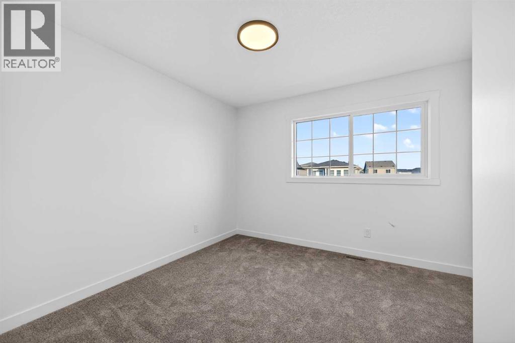 1055 Bayview Crescent Sw, Airdrie, Alberta  T4B 5N8 - Photo 31 - A2284926