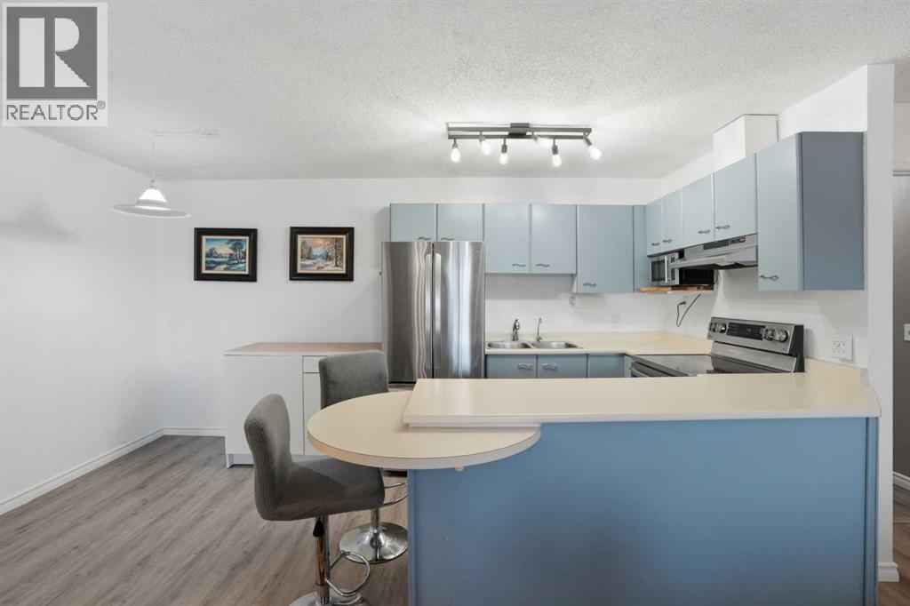 34, 1934 Edenwold Heights Nw, Calgary, Alberta T3A 3V2 - Photo 6 - A2277548