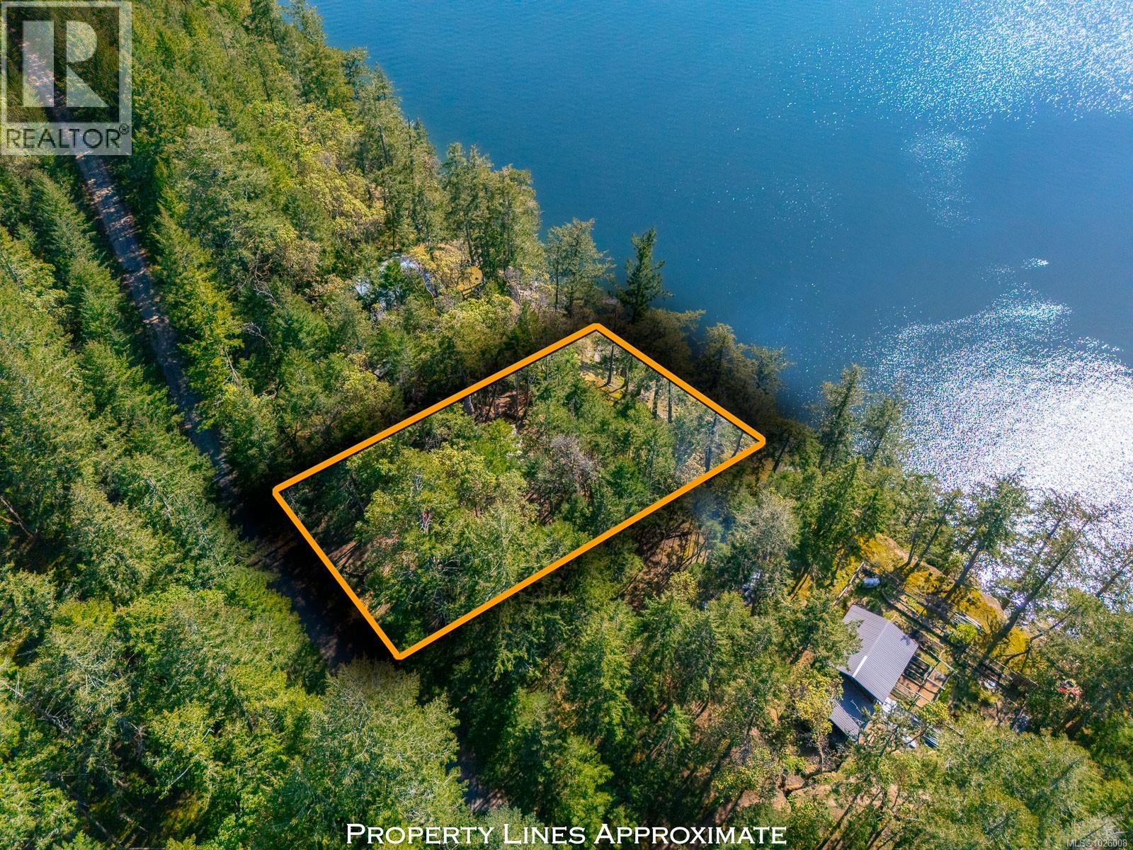 553 Flewett Dr, Decourcy Island, British Columbia  A1A 1A1 - Photo 1 - 1026008