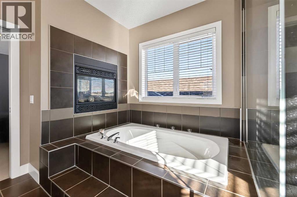 106 Montenaro Crescent, Cochrane Lake, Alberta  T4C 1A5 - Photo 14 - A2285057