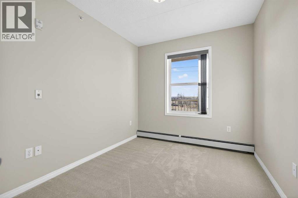 302, 400 1 Avenue Se, Diamond Valley, Alberta  T0L 0H0 - Photo 12 - A2286296