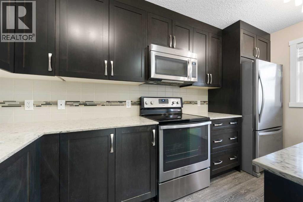 514 Auburn Bay Circle Se, Calgary, Alberta  T3M 2A2 - Photo 12 - A2286299