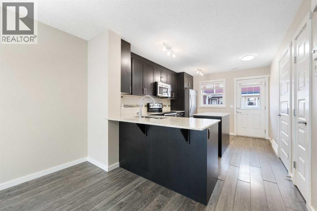 514 Auburn Bay Circle Se, Calgary, Alberta  T3M 2A2 - Photo 7 - A2286299