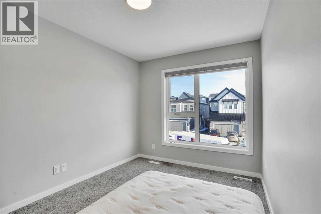 210 Lucas Close Nw, Calgary, Alberta  T3P 1Z4 - Photo 4 - A2284126