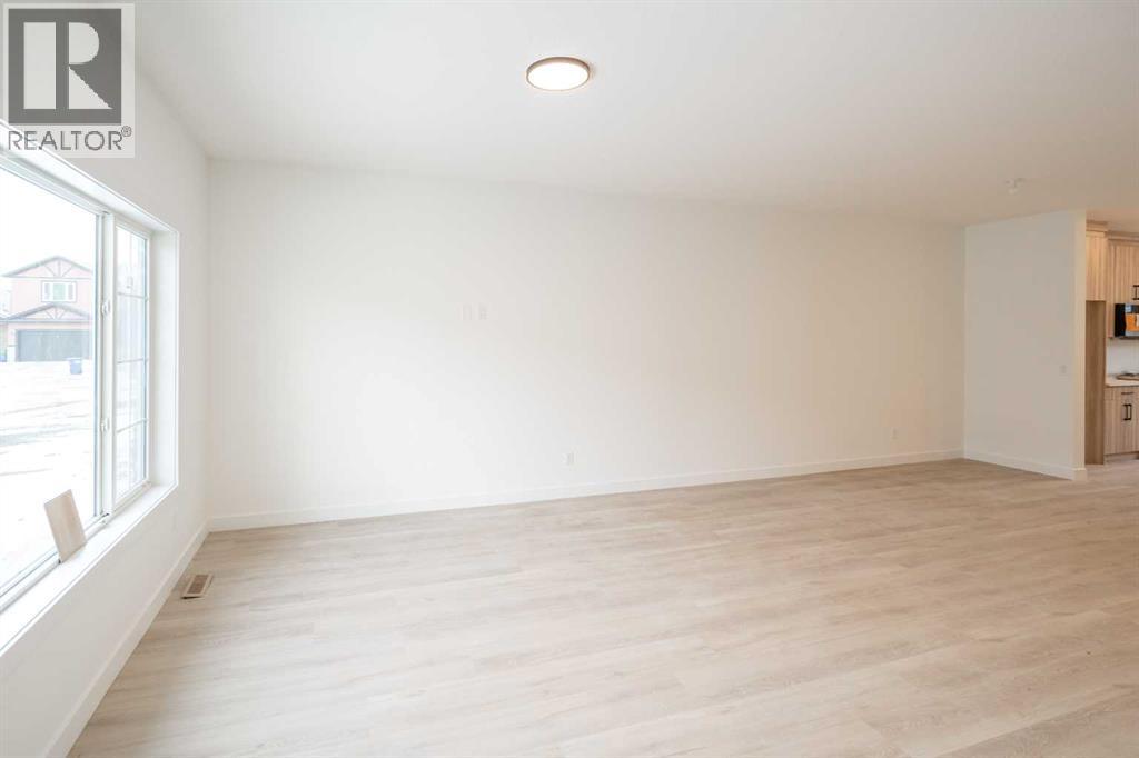 90 Baysprings Terrace Sw, Airdrie, Alberta  T4B 4A8 - Photo 2 - A2284616