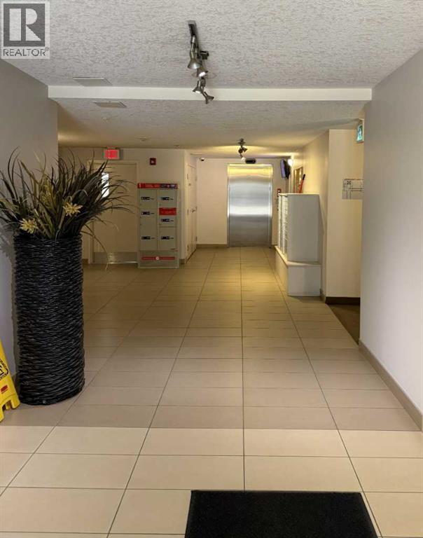 1403, 175 Panatella Hill Nw, Calgary, Alberta  T3K 0V9 - Photo 4 - A2286350