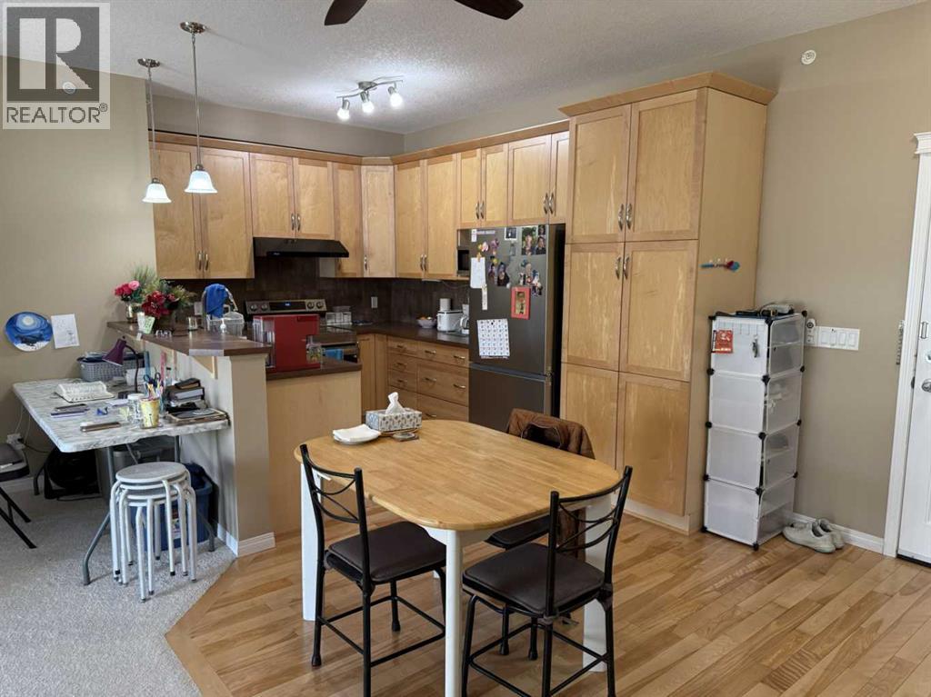 1403, 175 Panatella Hill Nw, Calgary, Alberta  T3K 0V9 - Photo 5 - A2286350