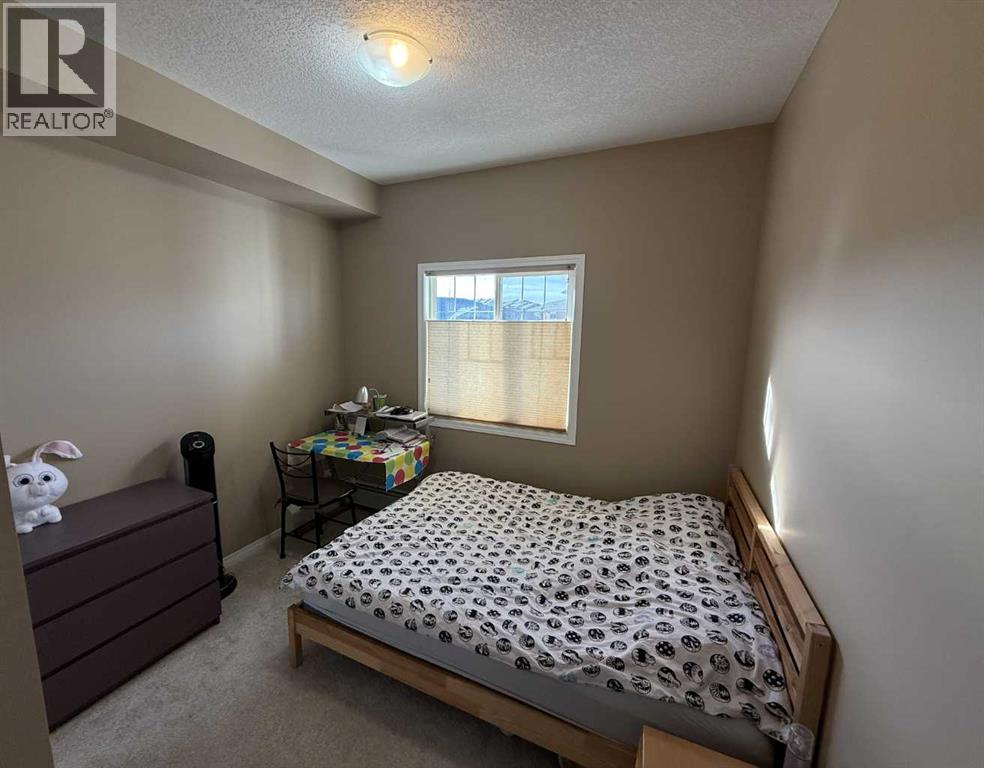 1403, 175 Panatella Hill Nw, Calgary, Alberta  T3K 0V9 - Photo 12 - A2286350