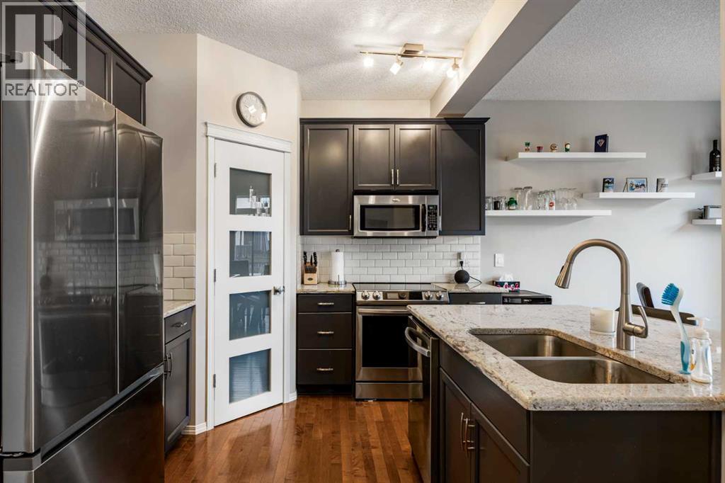 526 New Brighton Drive Se, Calgary, Alberta  T2Z 0N8 - Photo 4 - A2285484