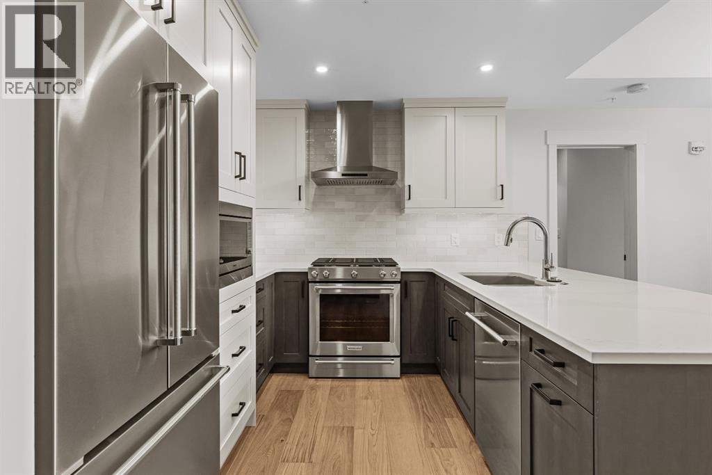 405, 1505 Spring Creek Gate, Canmore, Alberta  T1W 0N5 - Photo 4 - A2286370