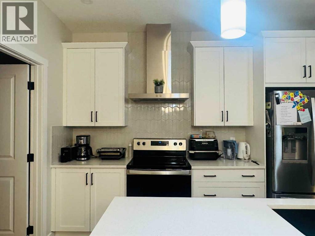 1509 Bayview Point Sw, Airdrie, Alberta  T4B 5K1 - Photo 8 - A2285478