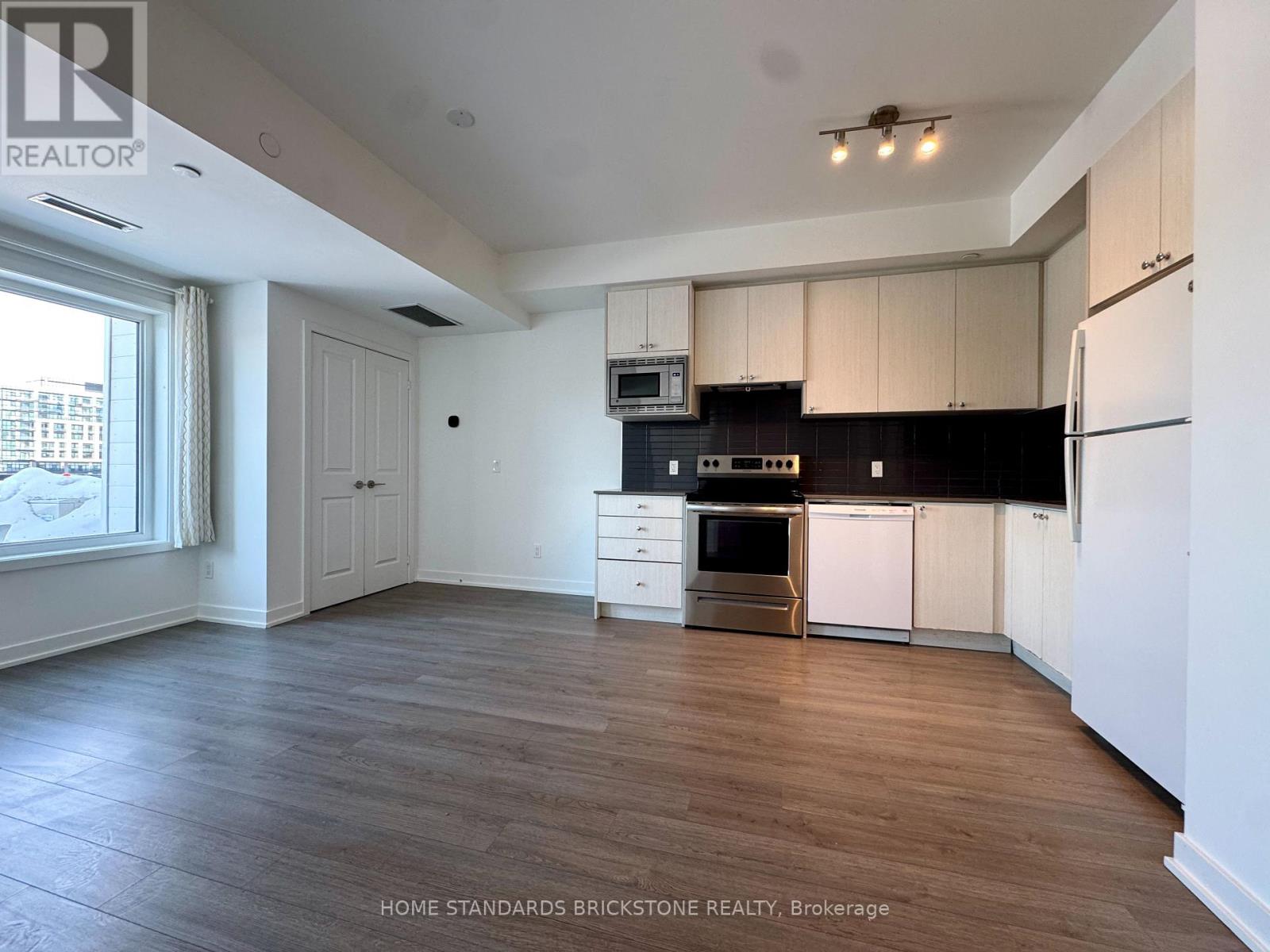 207 - 155 Downsview Park Boulevard, Toronto, Ontario  M3K 0E3 - Photo 6 - W12772376