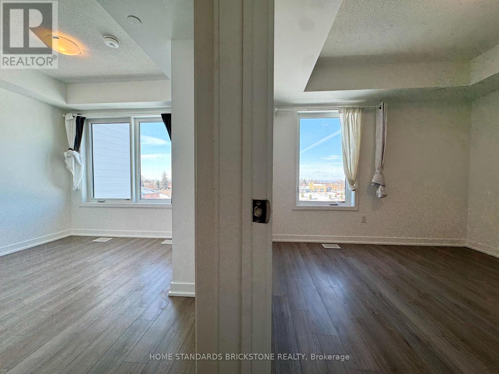 207 - 155 Downsview Park Boulevard, Toronto, Ontario  M3K 0E3 - Photo 21 - W12772376