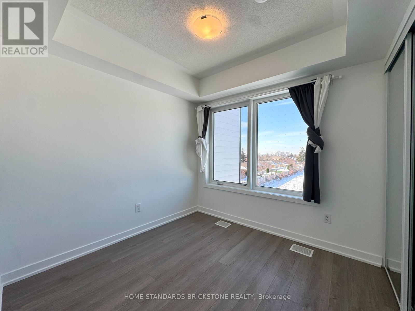 207 - 155 Downsview Park Boulevard, Toronto, Ontario  M3K 0E3 - Photo 18 - W12772376