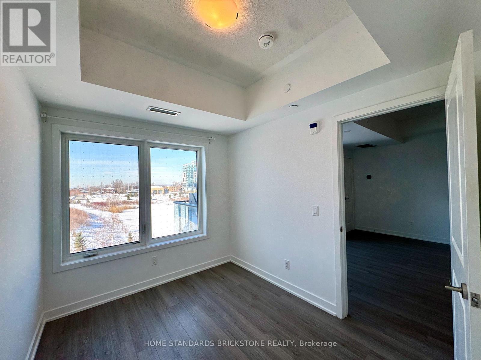 207 - 155 Downsview Park Boulevard, Toronto, Ontario  M3K 0E3 - Photo 10 - W12772376