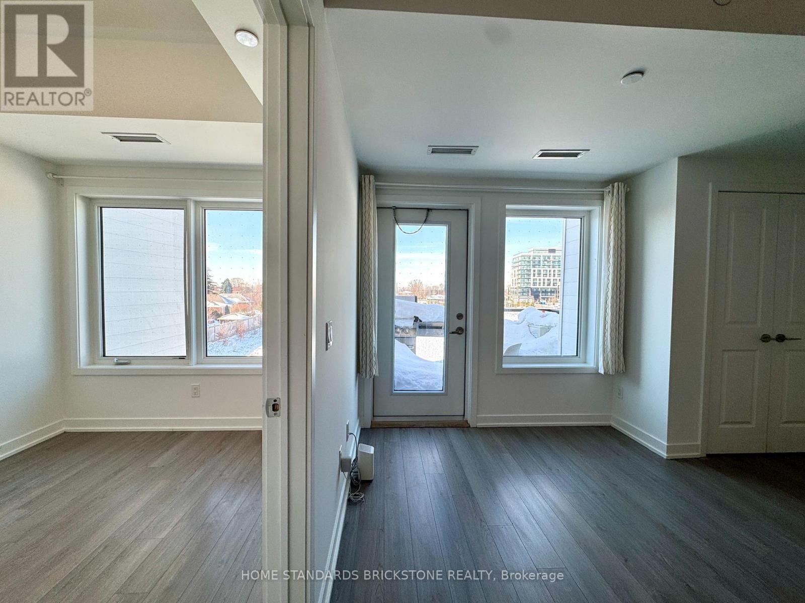 207 - 155 Downsview Park Boulevard, Toronto, Ontario  M3K 0E3 - Photo 9 - W12772376